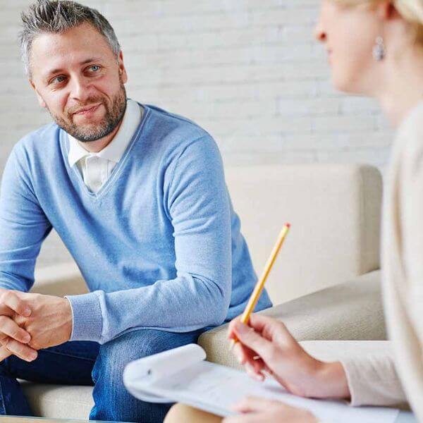 Man receiving counselling