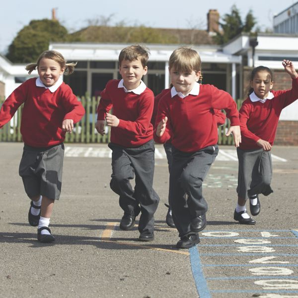 Children running on a school playground
