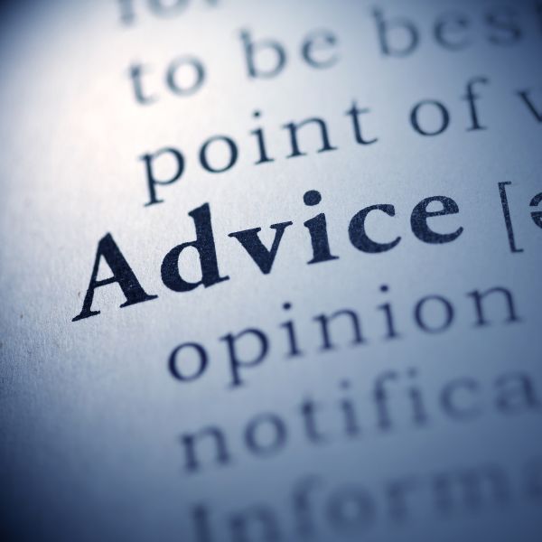 Close-up of dictionary definition for "Advice."